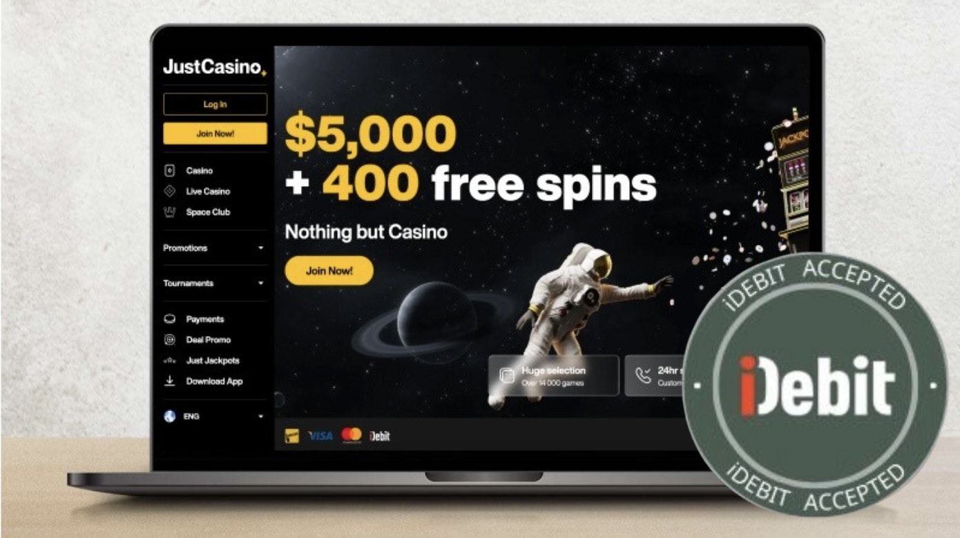 JustCasino main page on laptop screen