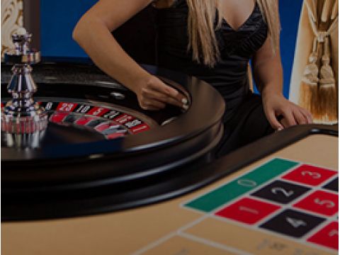Live Casino Dealer showcases the excitement at the Baccarat Table