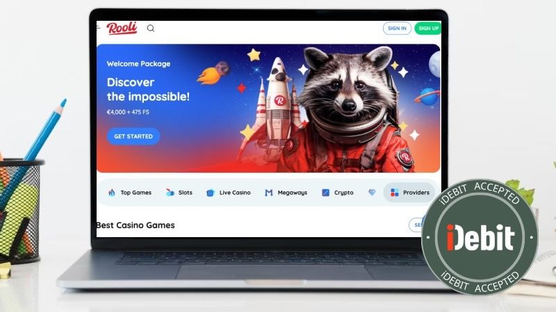 rooli casino main page on laptop screen